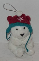 2014 Hallmark North Pole Polar Bear wearing Hat Plush Christmas Ornament - $9.60