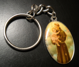 St Anthony Of Padua Key Chain Holding Baby Jesus Oval Metal Mid Length View - $6.99