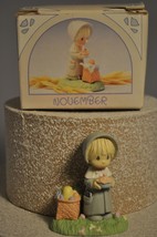 Precious Moments - November - Pilgrim Girl with Pie - 573892 Miniature - $9.90