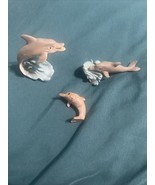 Small Dolphin Figurines - $367.57 MXN