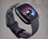 Fitbit Versa 4 Fitness Smartwatch Graphite Aluminum Case &amp; Black Infinit... - $124.00