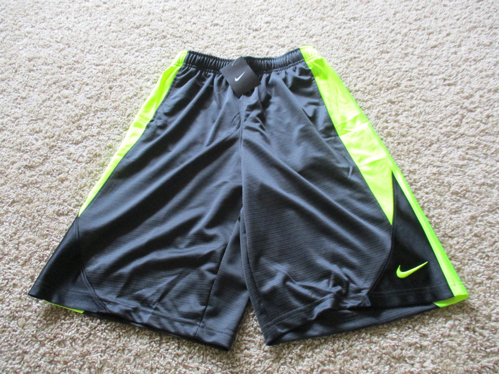 Primary image for BNWT Nike athletic shorts, boys, dark grey/fluorescent, Size L, pockets