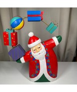 Wooden Santa Juggling Presents at Christmas Figurine Cottage - $17.41 CAD