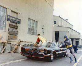 Adam West and Burt Ward in Batman jump out of Batmobile by building 16x20 Poster - £19.80 GBP