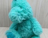 Kellytoy green Plush dinosaur blue feet spine sitting - $7.91