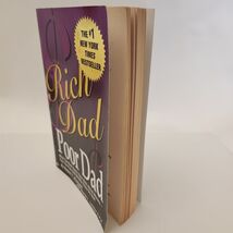 Rich Dad Poor Dad softbound book with book marker by Robert T Kiyosaki - $5.00