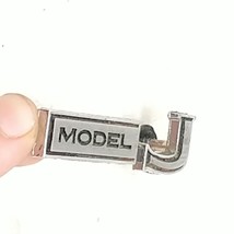 Pontiac 9798915 1969-70 Grand Prix Model J Chrome Console Name Emblem w ... - $473.47 MXN