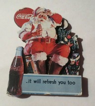 Coca-Cola 3-Magnet Santa and bottle  Rough on edges - $2.48