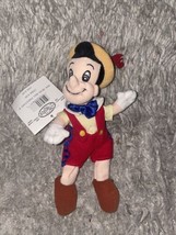 The Disney Store Pinocchio mini bean bag 8&quot; in excellent condition with tag - $4.95
