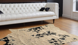 5&#39; X 8&#39; Off White Black and Gold Faux Cowhide Washable Area Rug - $249.43