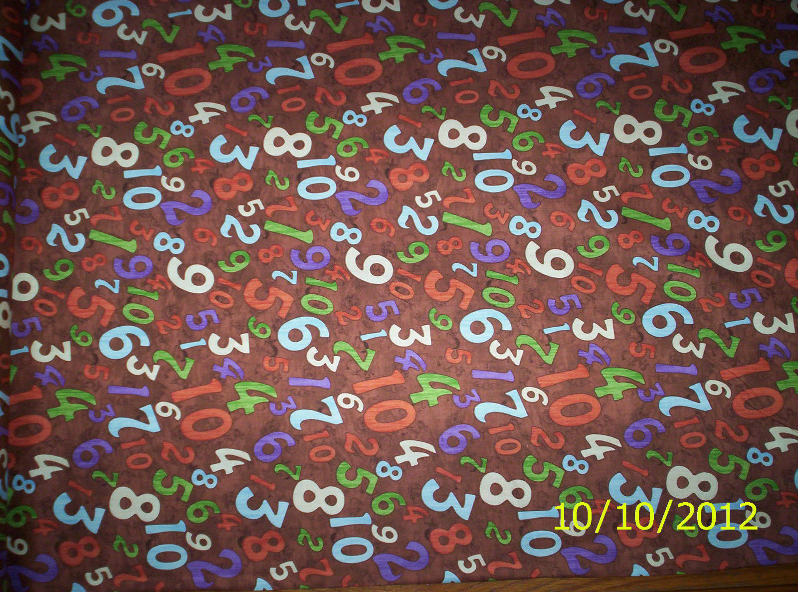 new Brown Number Toss with Bunnies in the Background 100% cotton by the yard - $7.18