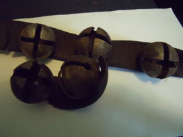 5 Vintage Sleigh Bells on pieces of leather - $90.00