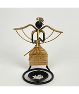 African Wrought Iron Brass Angel with Flute Wicker Pillar Candle Holder - $369.07 MXN
