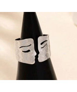 Kissing faces rings - $247.32 MXN