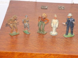 5 Vintage Cast Metal Toy Figures - $44.55