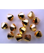 8 4mm Swarovski 5301 Crystal Bicones - Crystal Aurum 2x - $1.94