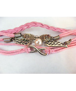 ONE DIRECTION BRIGHT PINK BRAIDED AND CORDED BRACELET TWO OWLS AND WINGS - $7.25 CAD