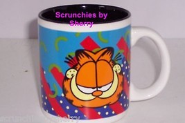Garfield Coffee Mug Cat Ceramic Tea Paws Red Blue Teal - £11.95 GBP