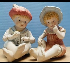 Vintage Bisque Piano Babies 2 Figurines Boy and Girl Andrea by Sadek 7-in - £21.42 GBP
