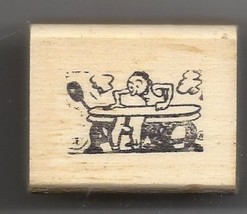 Guy Using an ironing press to iron rubber stamp ab - $13.63