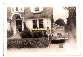 vintage snapshot * nice car parked in driveway next to flowers and big h... - $7.95