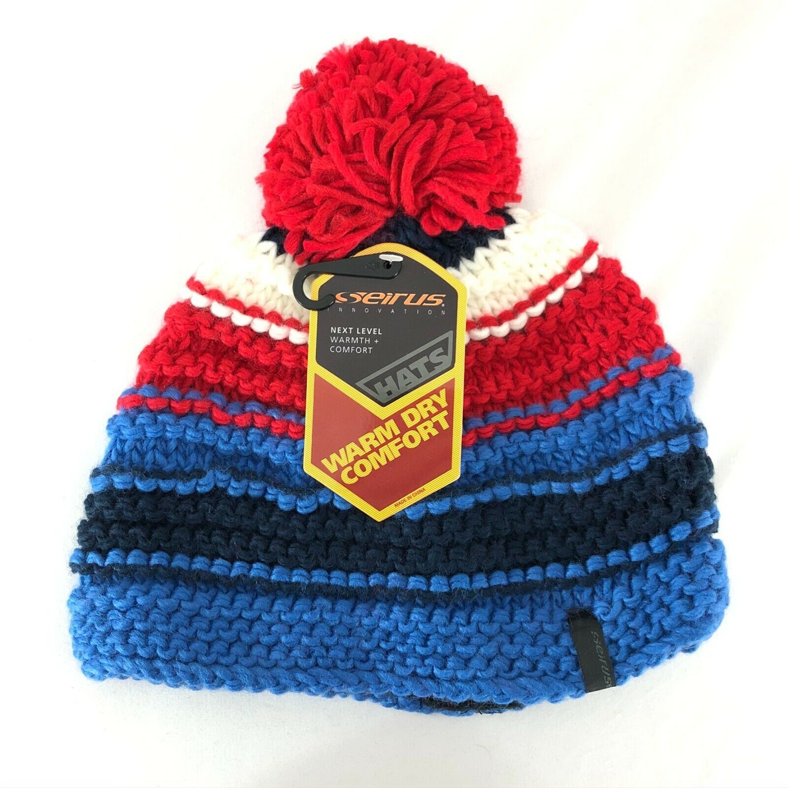 Primary image for Seirus Beanie Hat Knit Pom Striped Warm Dry Comfort Red White Blue One Size