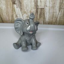 Vintage Sitting Elephant Figurine Gray Ceramic Trunk Up Collectible Decor - $19.99
