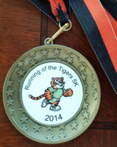 An item in the Movies & TV category: Running of the Tigers 5K 2014 Bronze medal