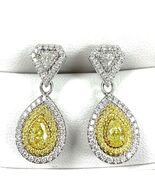 Authenticity Guarantee

Dangle Earrings 1.59 TCW Yellow Pear Brilliant C... - $144,745.30 MXN