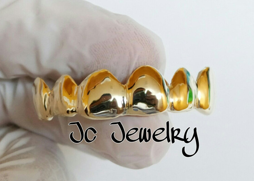 6 Piece Gold Grill - $100.00