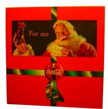 5 Coca Cola Santa Phone Cards with Display Folder - $49.00