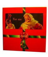 5 Coca Cola Santa Phone Cards with Display Folder - $49.00