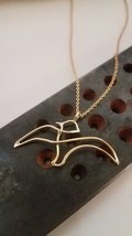 Gold necklace. 14 karat solid yellow gold necklace a bird pendant. Handmade pend - £253.10 GBP