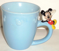 Disney Store Mickey Mouse Coffee Mug Figurine Lounging On Handle Light B... - $59.95