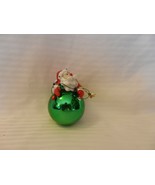 Resin Santa Claus Laying on Glass Ornament With Christmas Lights - $14.25