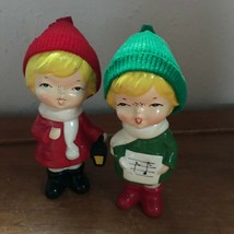 Vintage Lot of 2 Green &amp; Red Painted Ceramic Caroling Girls w Knit Hat Christmas - £11.79 GBP