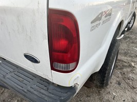 Passenger Tail Light Rectangular Fits 99-07 FORD F250SD PICKUP 104765328 - $72.88