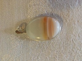 Beautiful ivory stone pendant  with peach stripes  - $20.00