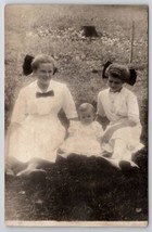 RPPC Sweet Victorian Girls With Baby Sister On Lawn Large Hair Bows Postcard K23 - £7.82 GBP
