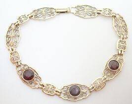 Authenticity Guarantee

10k Yellow Gold Filigree Bracelet with Three Gen... - €560,08 EUR