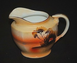 Old Vintage Milk Creamer Tree in the Meadow Design Red Marked Japan - $12.86