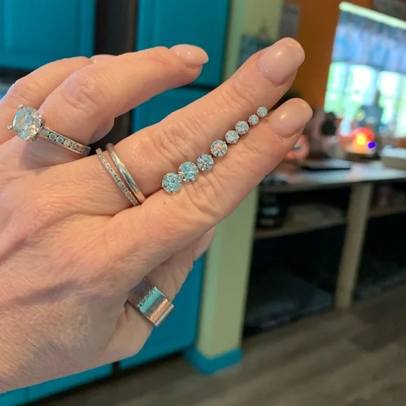 4 pairs of brilliant white Moissanite - $200.00