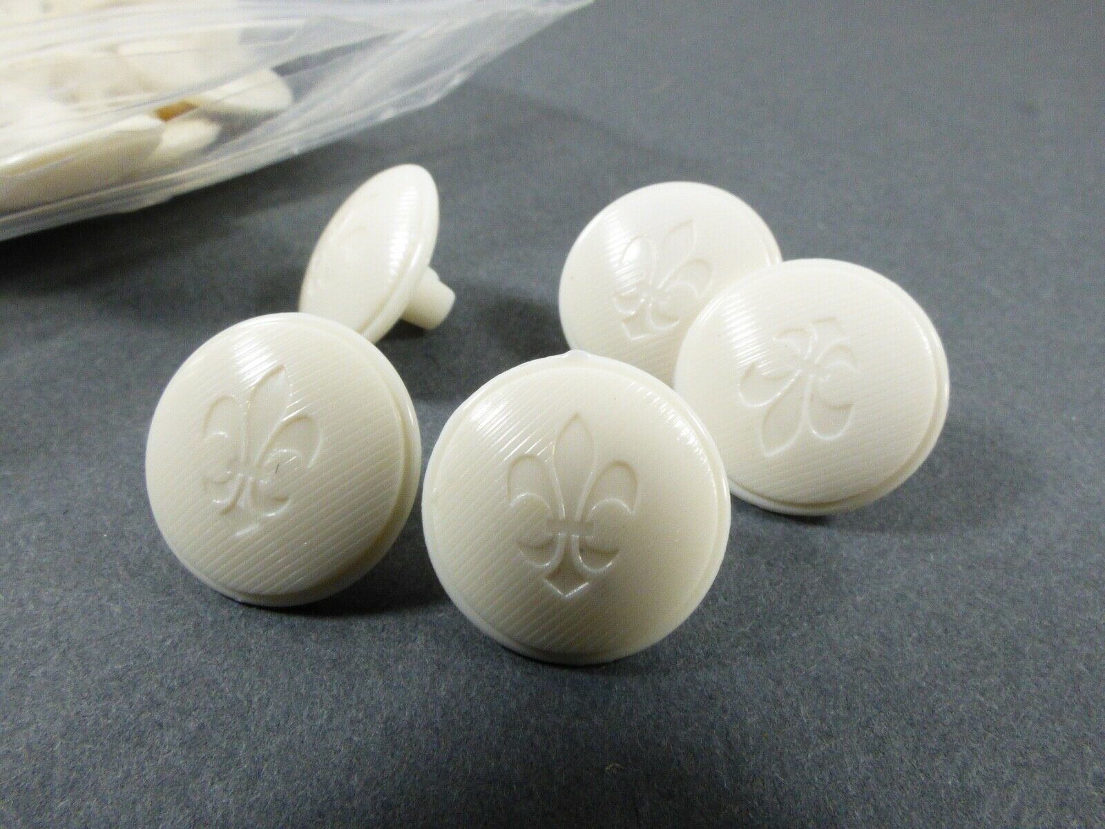 lot of 61 pc White color Flur de Lis  Plastic Sewing Buttons - $16.83