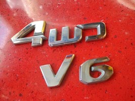 2005-2009 HYUNDAI TUCSON &quot;V6 4WD, Rear Lid Chrome Emblem Logo Badge Set oem used - £10.65 GBP