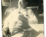 Man Smoking Pipe as He Sits in His Chair Real Photo Postcard - $10.89