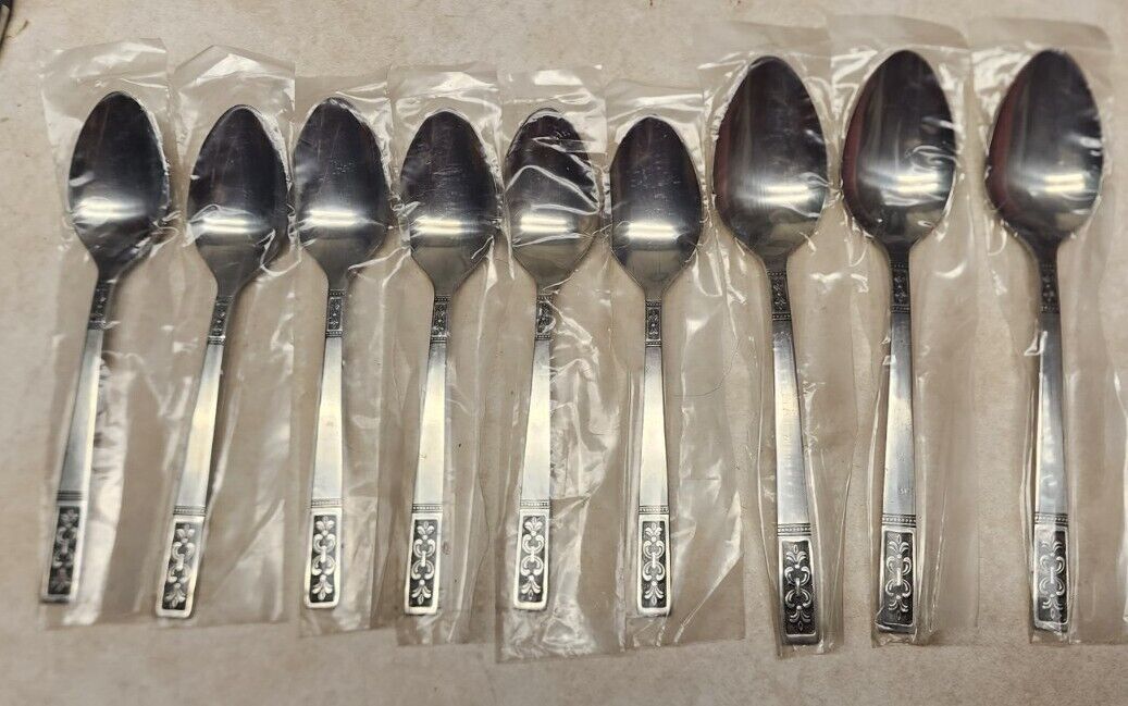 Primary image for Mid Century IIC Stainless Steel Fleur de Lis Spoons Flatware 9 pc NOS