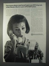 1966 Western Electric Ad - Haven&#39;t Gone up with Costs - £14.50 GBP