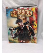 *Damaged* Bioshock Infinite Bradygames Strategy Guide Book - $272.68 MXN