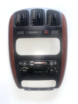 01-07 USED GENUINE CARAVAN/ TOWN &amp; COUNTRY RADIO BEZEL W/ VENTS, P/N 050... - $65.33