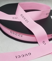 GUCCI GIFT WRAP RIBBON PINK WITH BLACK LETTERS SOLD BY YARD - £13.98 GBP